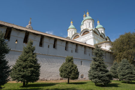 Astrakhan, Russia. View of the wall of the Astrakhan Kremlin and the domes of the Assumption...