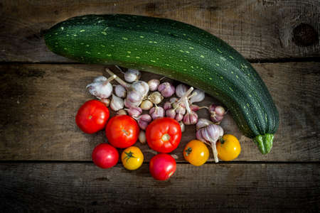 Fresh farm natural vegetables, carrots, zucchini, garlicの写真素材