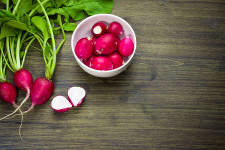 Radish fresh summer for cooking salads. Rustic style. Growing organic food. Juicy radish on a wooden table.の写真素材