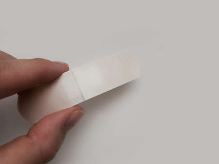patch in hand on a white background.の写真素材