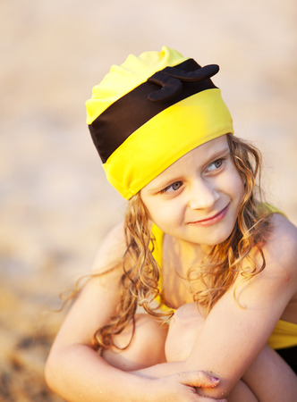 the little girl at the beach sunsetの写真素材