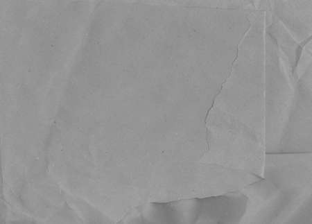 Recycled packaging, horizontal kraft page texture, wrapping paperboard, copy space grunge backdrop, retro abstract texture, vintage background craft paper tan, grayの写真素材
