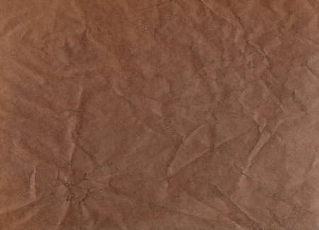 recycled packaging, horizontal kraft page texture, wrapping paperboard, copy space grunge backdrop, retro abstract texture, vintage background rumpled craft paper tan, beige, ivoryの写真素材
