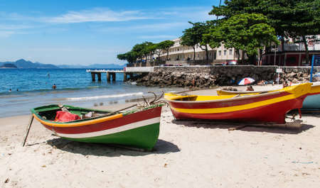 Two boats on the Copacabana beach and Fort of Copacabana in Rio de Janeiroの写真素材