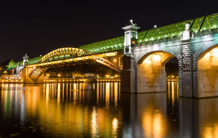 Night view of Andreevsky bridge on Moscow River in Moscow, Russiaの写真素材