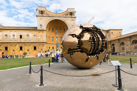 Sphere within sphere in Courtyard of the Pinecone at Vatican Museums, Sphere was created in 1990 by Italian sculptor Arnoldo Pomodoro  のeditorial素材