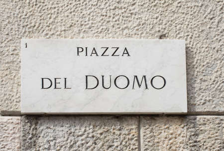 Street sign of piazza del Duomo in Milan, Italyの写真素材