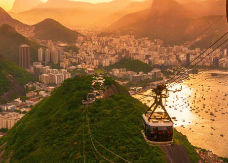 Sunset view of Botafogo, mountain Urca and cable car to mountain Sugar Loaf in Rio de Janeiro. Brazilの写真素材