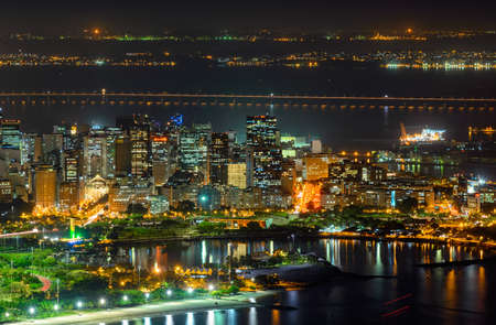 Night aerial view of Centro (downtown of Rio de Janeiro), Flamengo, Gloria and Guanabara bay Rio de Janeiro, Brazil.の写真素材