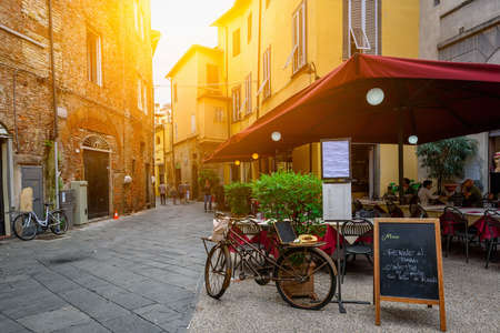 Old cozy street in Lucca, Italyの写真素材