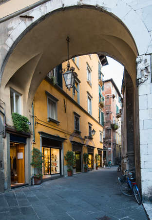 Narrow old cozy street in Lucca, Italyの写真素材