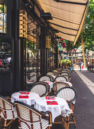 Cozy street with tables of cafe in Paris, Franceの写真素材