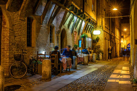 Cozy street with old houses in Ferrara, Emilia-Romagna, Italy. Ferrara is capital of the Province of Ferrara.の写真素材