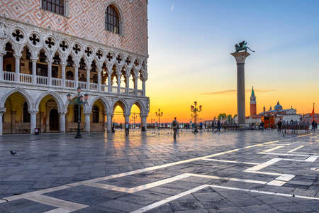 Sunrise view of piazza San Marco, Doge's Palace (Palazzo Ducale) in Venice, Italy. Architecture and landmark of Venice. Sunrise cityscape of Venice.の写真素材