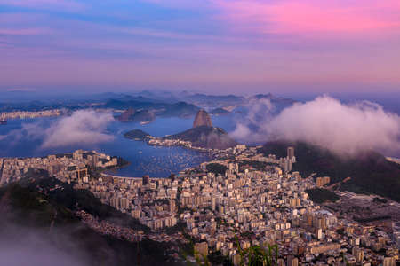 The mountain Sugar Loaf and Botafogo in Rio de Janeiro at sunset, Brazilの写真素材