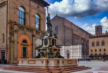 The Fountain of Neptune (Fontana di Nettuno) located in Piazza del Nettuno in Bologna, Italy. Architecture and landmark of Bologna. Cityscape of Bologna.の写真素材