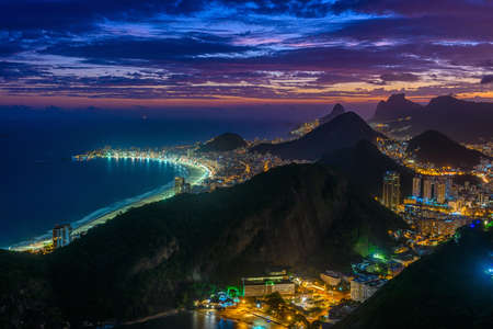 Sunset view of Copacabana, Urca and Botafogo in Rio de Janeiro, Brazil. Skyline of Rio de Janeiro....