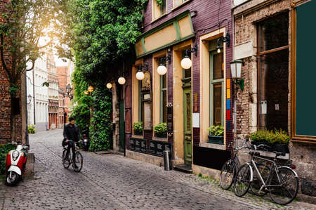Old narrow street in Ghent (Gent), Belgium. Architecture and landmark of Ghent. Cozy cityscape of Ghent.の写真素材