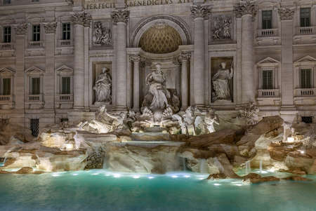 Night view of Rome Trevi Fountain (Fontana di Trevi) in Rome, Italy. Trevi is most famous fountain of Rome. Architecture and landmark of Romeの写真素材