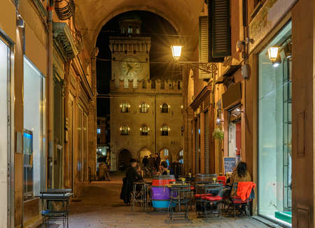 Old narrow street with arcade in Bologna, Emilia Romagna, Italy. Architecture and landmark of...