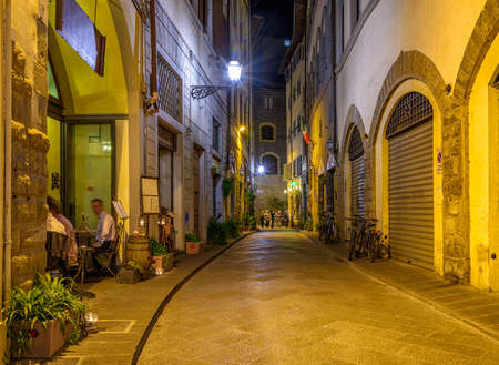 Night view of narrow street in Florence, Tuscany. Italyの写真素材