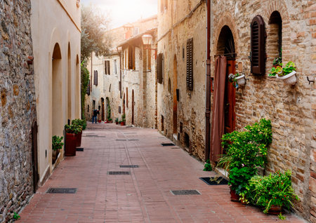 Old street in San Gimignano, Tuscany, Italy. San Gimignano is typical Tuscan medieval town in Italyの写真素材