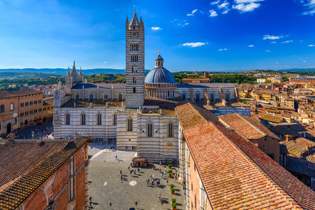 View of Siena Cathedral (Duomo di Siena) and Piazza del Duomo in Siena, Italy. Skyline of Siena.の写真素材