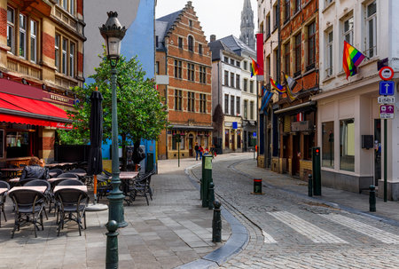 Old street with tables of cafe in center of Brussels, Belgium. Cozy cityscape of Brussels (Bruxelles). Architecture and landmarks of Brussels.の写真素材