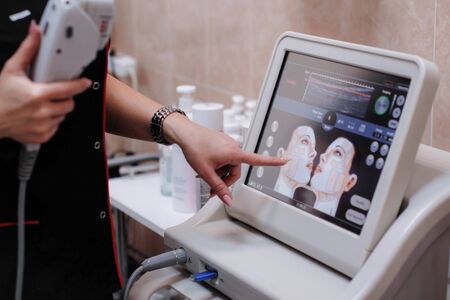 Russia, Novosibirsk, January 5, 2020. Woman beautician in the office for cosmetic and medical proceduresのeditorial素材