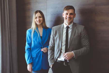 Portrait of a man and woman in business suits