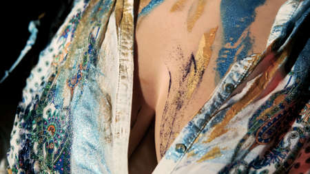 Paint on a womans body. Body Art.