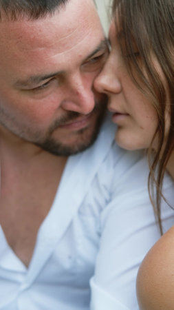 Man and woman in love feeling happy and romantic, hugging.の写真素材