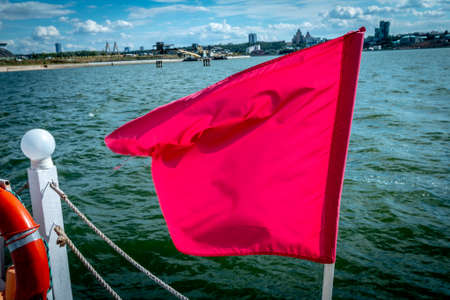 red flag on a river