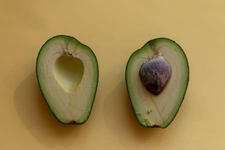 Green tropical half of avocado top view