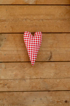 heart on natural wooden backgroundの写真素材