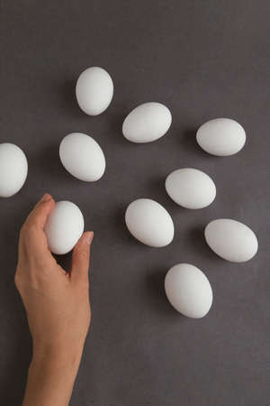 white eggs on gray backgroundの写真素材