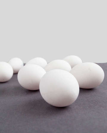 white eggs on gray background