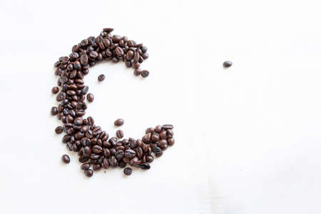 coffee beans isolated on whiteの写真素材