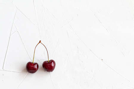 Cherry isolated on gray backgroundの写真素材