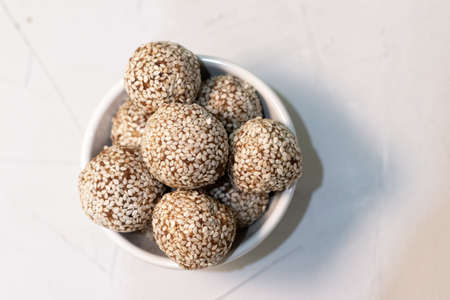 Homemade sweets energy balls made from superfoods like seeds, nuts and dried fruits. Healthy snack,...