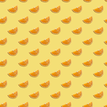 Digital seamless pattern with orange slices on green mint background. Repeating elementsの写真素材