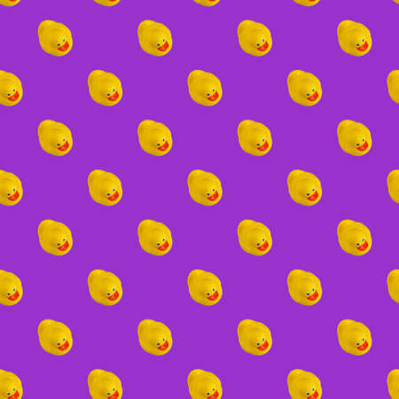 Digital seamless pattern of yellow rubber duck on purple backgroundの写真素材