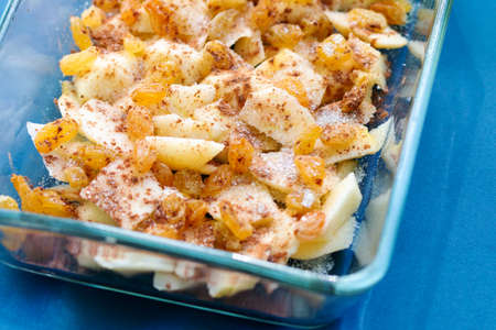 traditional apple pie preparation, healthy eating and home cooking conceptの写真素材