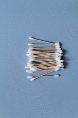 Organic bamboo sticks on blue background, eco-friendly plastic free and zero waste concept. Selective focusの写真素材