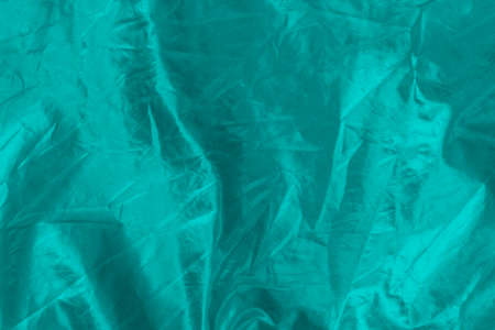 Green glowing textured background, selective focus, empty space for text