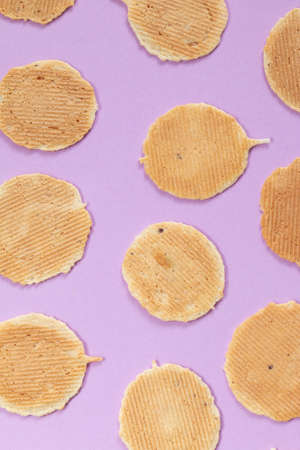 homemade cookies on purple background, creative food photographyの写真素材