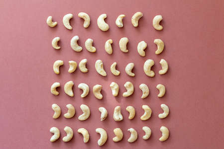 group of nuts on brown background, healthy food concept, empty space for textの写真素材