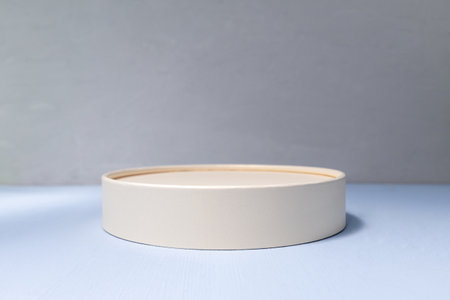 White empty pedestal on blue backgroundの写真素材