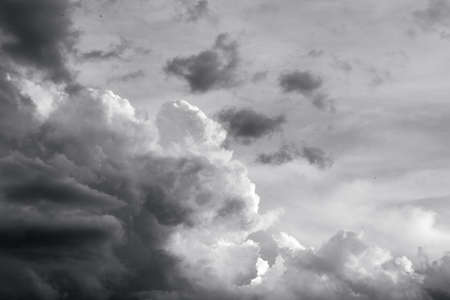 fluffy stormy clouds in black and white mode