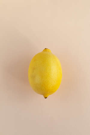 lemon on pink background, flat lay viewの写真素材